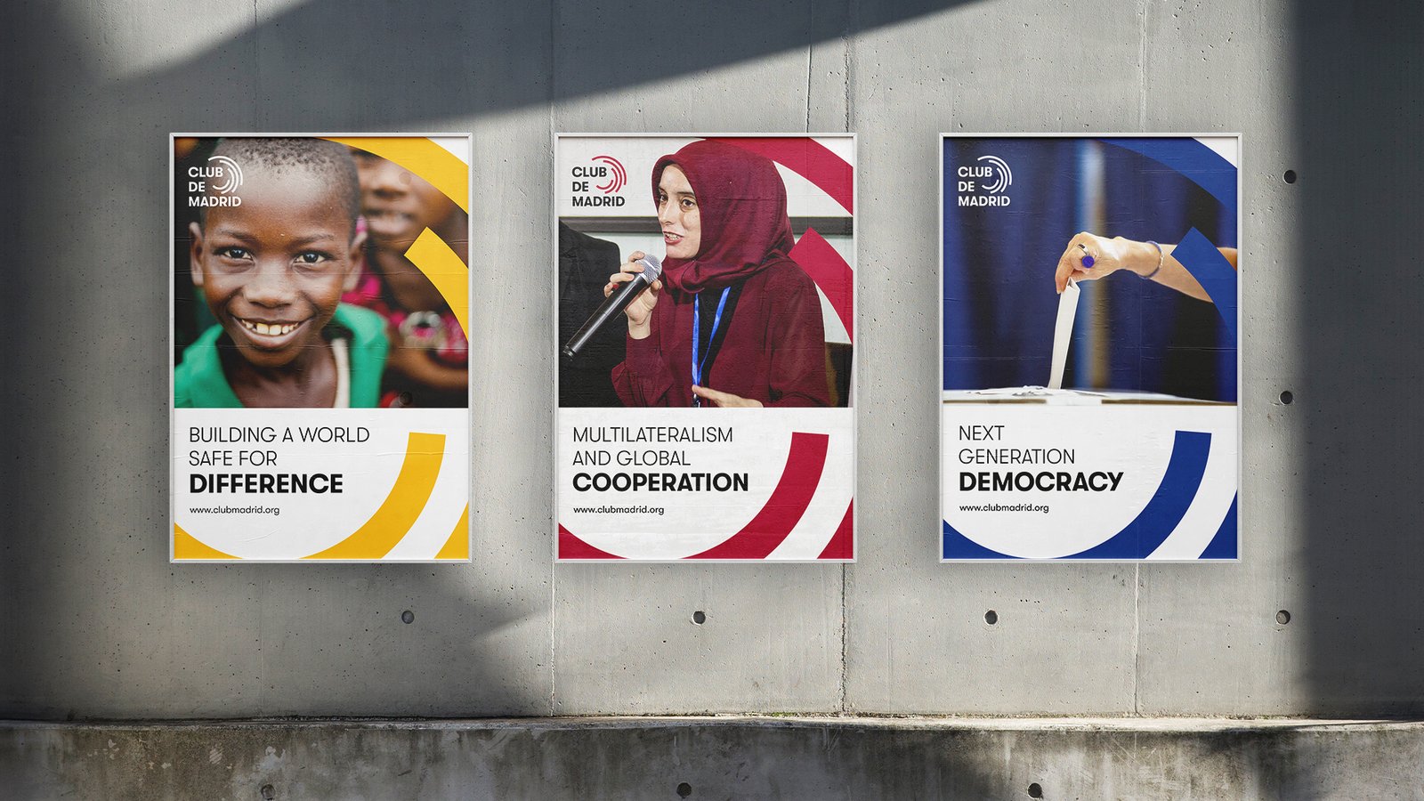 Club de Madrid campaign posters applying the identity across democracy and cooperation themes.